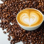 Latte art, coffee in coffee beans background